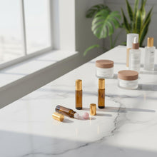 Load image into Gallery viewer, 4 PACK Roller Bottles with Natural Rose Quartz Balls - 10ml Refillable Amber Glass Essential Oil Roll On Kit, Leak-Proof for Travel, Aromatherapy, DIY Perfume & Gifts (10ml Pink Glod Amber Bottles)