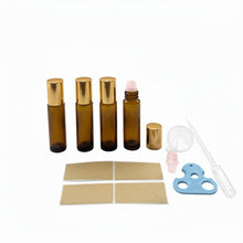 Load image into Gallery viewer, 4 PACK Roller Bottles with Natural Rose Quartz Balls - 10ml Refillable Amber Glass Essential Oil Roll On Kit, Leak-Proof for Travel, Aromatherapy, DIY Perfume & Gifts (10ml Pink Glod Amber Bottles)