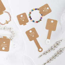 Load image into Gallery viewer, joycraft 200Pcs Self Adhesive Bracelet Display Cards,Kraft Handmade with Love Blank Cards, Jewelry Packaging for Selling, Hanging Display Cards for Jewelry, Bracelet, and Necklace(4“x1.5")