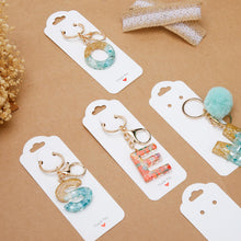 Load image into Gallery viewer, joycraft 100Pcs Keychain Cards, 2.1"x5.9" White Paper Cards Keychain Display Holder, Thank You Hanging Cards for Selling, Hanging Display Keychain, Bracelet, and Jewelry