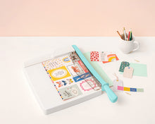 Load image into Gallery viewer, We R Memory Keepers Guillotine Trimmer – 12" Large Paper Cutter with 1/4-Inch Grid, Cuts Up to 10 Sheets, Perfect for Scrapbooking, Journals, Cards, and Craft Projects, Blue