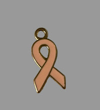 Load image into Gallery viewer, Pink ribbon charm on a textured fabric background