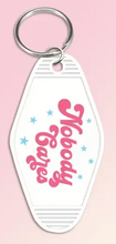 Load image into Gallery viewer, Sassy Anti-Social Sarcastic Motel Keychains – Retro Charm for Modern Adventures - Al-A12