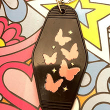 Load image into Gallery viewer, Black coffin Retro Motel Acrylic Message Keychain with pink butterflies