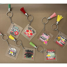 Load image into Gallery viewer, A Teacher Opens a Mind Takes & Touches a Heart Acrylic Keychain Sticker 1.96"