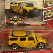 Load image into Gallery viewer, Tracksters 2005 Die Cast 1:64 Premier Ltd Ed Yellow Hummer H2 On-line Racing