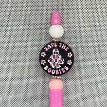 Load image into Gallery viewer, Pink and black pen with &#39;Save the Boobies&#39; design on a textured gray background
