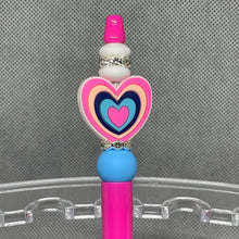Load image into Gallery viewer, Colorful pen with heart design on a gray background
