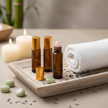 Load image into Gallery viewer, 4 PACK Roller Bottles with Natural Rose Quartz Balls - 10ml Refillable Amber Glass Essential Oil Roll On Kit, Leak-Proof for Travel, Aromatherapy, DIY Perfume &amp; Gifts (10ml Pink Glod Amber Bottles)
