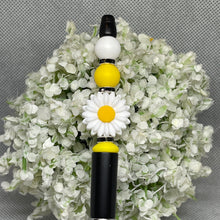 Load image into Gallery viewer, Decorative pen with a daisy design on a white floral background
