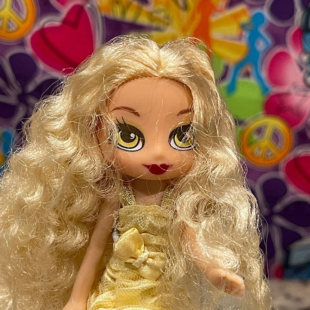MGA Penny Pineapple Yummi-Land Doll with Skunk Pet & Accessories