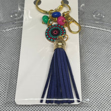 Load image into Gallery viewer, Keychain with tassel and colorful beads on a white card
