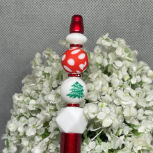Load image into Gallery viewer, Decorative bottle stopper with red, white, and green design on a floral background
