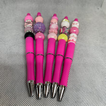 Load image into Gallery viewer, Set of pink pens with decorative beads on a textured surface
