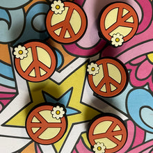 Load image into Gallery viewer, Colorful pattern with peace signs and flowers on a vibrant background
