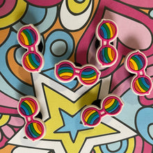 Load image into Gallery viewer, Colorful sunglasses and star-shaped objects on a psychedelic patterned background
