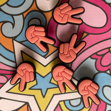 Load image into Gallery viewer, Colorful abstract design with peace signs and geometric shapes

