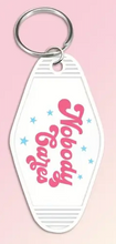 Load image into Gallery viewer, Sassy Anti-Social Sarcastic Motel Keychains – Retro Charm for Modern Adventures - Al-A12
