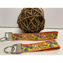 Load image into Gallery viewer, Mother &amp; Daughter Retro Groovy 60s Orange Peace Sign Symbol  Dove 7/8&quot; Grosgrain Wristlet Keychains
