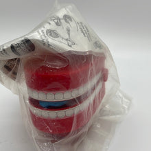 Load image into Gallery viewer, Burger King 1997 M&amp;M Red Chomping Chattering Teeth Swarm
